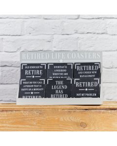 SLATE RETIREMENT COASTER 6 ASSTD 24/STAND WITH WHITE QUOTE