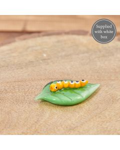GLASS CATERPILLAR ORNAMENT IN BOX YELLOW ON GREEN LEAF