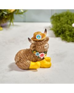 HIGHLAND COW RESIN SITTING ORNAMENT WITH WELLIES AND HAT
