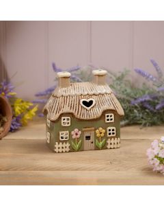 STONEWARE GREEN THATCHED COTTAGE WITH EMBOSSED FLOWERS TEA LIGHT HOLDER