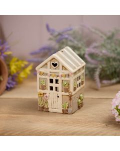 STONEWARE GREEN HOUSE WITH EMBOSSED FLOWERS TEA LIGHT HOLDER
