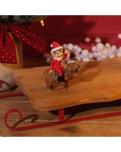 ELF CREW SITTING ON HIGHLAND COW RESIN ORNAMENT