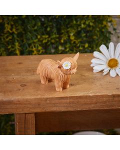 HIGHLAND COW ORNAMENT BROWN TEXTURED RESIN WITH DAISY SS25