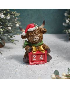 HIGHLAND COW WITH SANTA HAT AND SCARF RESIN COUNTDOWN ADVENT ORNAMENT