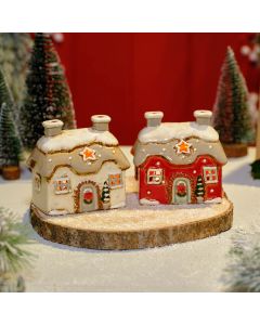 XMAS COTTAGE TEALIGHT HOLDER 2 ASSTD RED OR WHITE STONEWARE